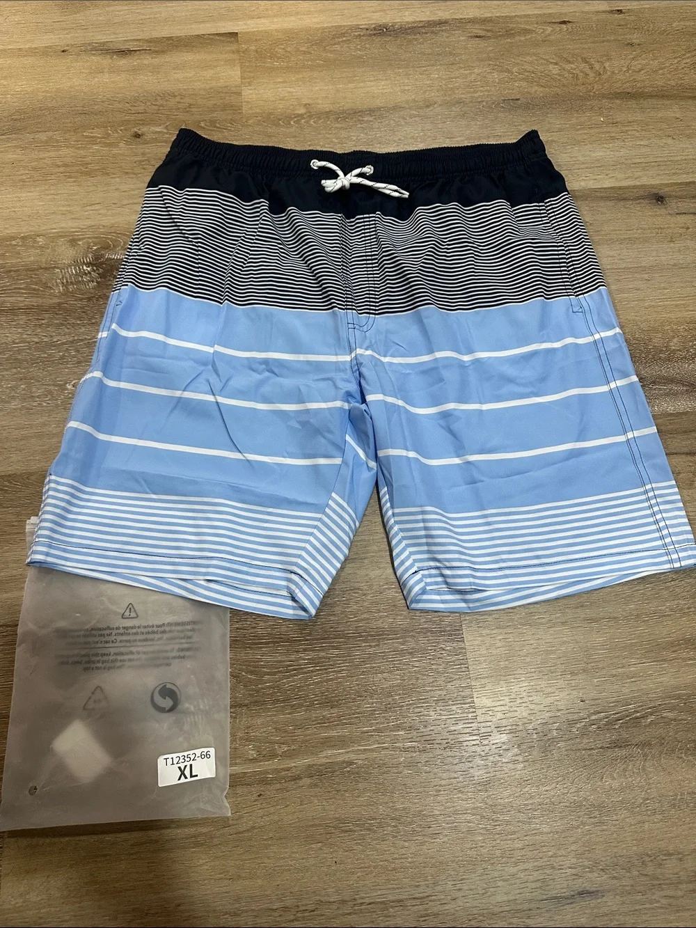 Men's Light Blue Striped Swim Trunks with Navy Waistband